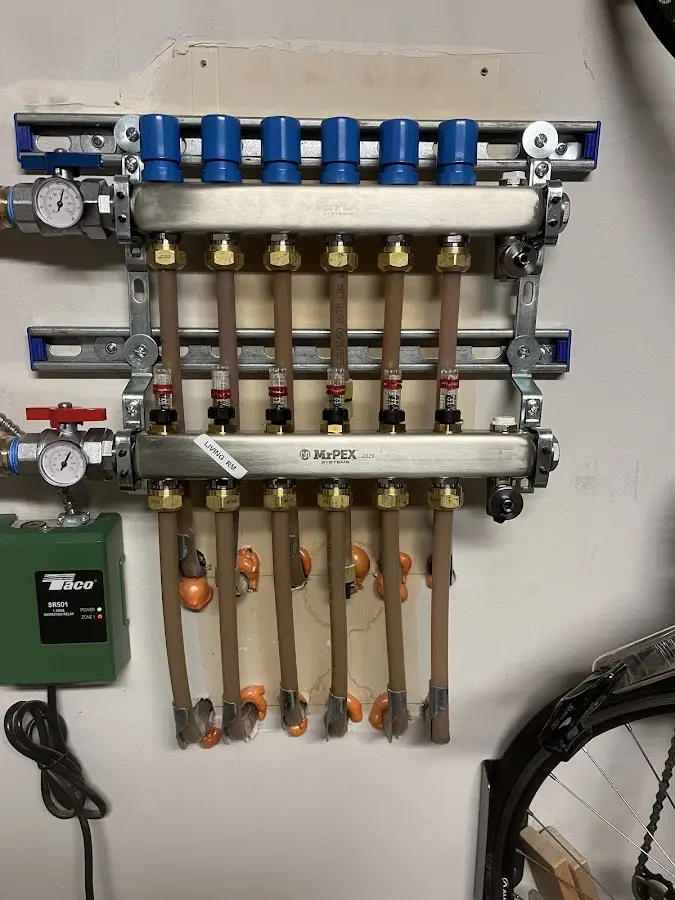 Plumber performing Gas Line Installation at a residential property in Ken Caryl